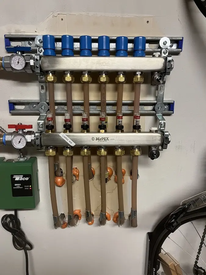 Plumber performing Gas Line Installation at a residential property in Kensington